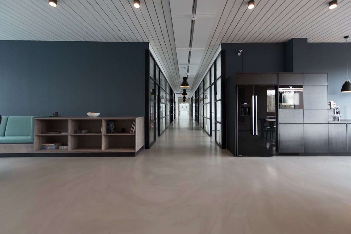 Law firm — open office, laptops and documents